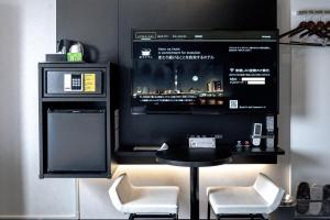 Kuchyň nebo kuchyňský kout v ubytování Henn na Hotel Tokyo Asakusabashi