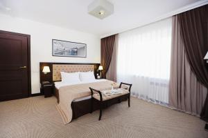 Кровать или кровати в номере Hotel Home Parq