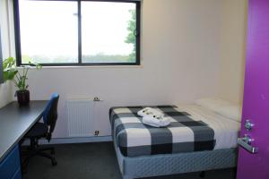En eller flere senger på et rom på Western Sydney University Village - Penrith