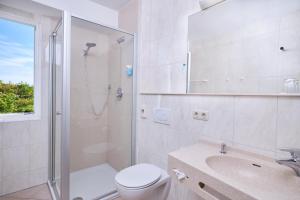 Koupelna v ubytování Hotel Schwertfirm