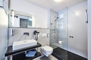Koupelna v ubytování Hotel Schwertfirm