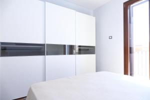 Posteľ alebo postele v izbe v ubytovaní Terrazza della Rocca (by Vacation Service)