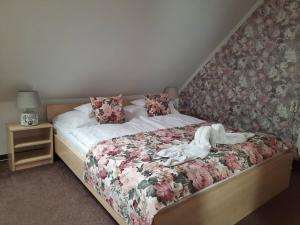 Posteľ alebo postele v izbe v ubytovaní Kék Lagúna Wellness Apartmanok