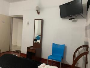 TV o dispositivi per l'intrattenimento presso Sobha Holiday Home