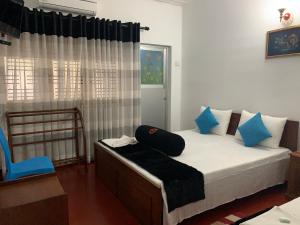 Letto o letti in una camera di Sobha Holiday Home