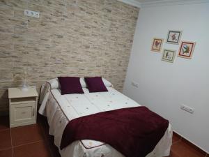 Postel nebo postele na pokoji v ubytování Villa Rosa