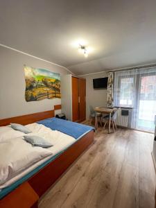 Postel nebo postele na pokoji v ubytování Pokoje Beata + 37 fotografií