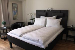 Postel nebo postele na pokoji v ubytování Støren Hotel + 11 fotografií
