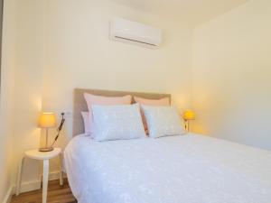 Łóżko lub łóżka w pokoju w obiekcie Cubo's Villa Loft El Parador de la Sierra