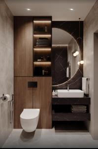 Et badeværelse på Дизайнерские Апартаменты класса Люкс!