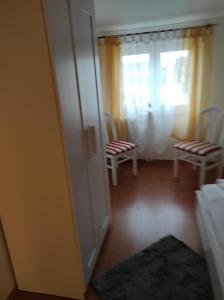 Postel nebo postele na pokoji v ubytování Apartments and Rooms PUNTA