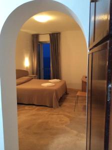 Hotel Borgo Cacciatori客房内的一张或多张床位