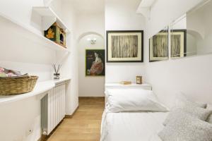 Posteľ alebo postele v izbe v ubytovaní Leopardo 28 - Loft in Trastevere