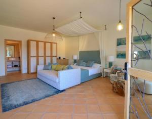 Postel nebo postele na pokoji v ubytování Hotel Borgo Smeraldo + 37 fotografií