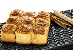 a group of pastries sitting on a grill at The Raintree, St. Mary’s Road in Chennai
