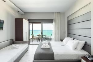 Voodi või voodid majutusasutuse Tridente Mare Apart Hotel toas