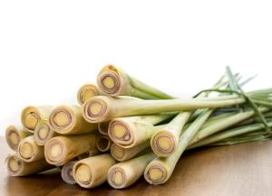 a pile of green onions sitting on a table at The Raintree, St. Mary’s Road in Chennai