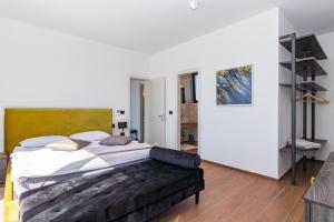Postel nebo postele na pokoji v ubytování Villa Sabina