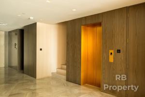 a hallway with a row of elevators in a building at FIVE Palm Beach Villa - Three Floors, Private Pool, Jacuzzi in Dubai
