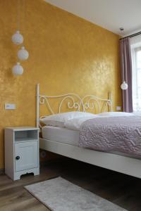 Postel nebo postele na pokoji v ubytování Modrá Hortenzie
