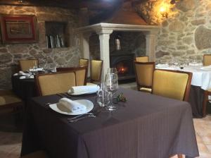 Reštaurácia alebo iné gastronomické zariadenie v ubytovaní Casa Da Urcela