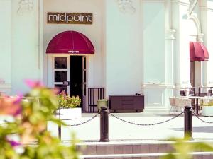 a entrance to a restaurant with a sign on a building at The Land Of Legends Kingdom Hotel - All-in Concept in Belek