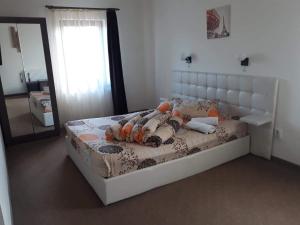 Postel nebo postele na pokoji v ubytování Pensiunea Diadis + 37 fotografií