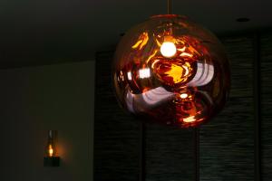 a glass ball is hanging from a ceiling at Agriturismo Terra del Sole in Albosaggia