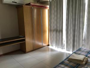 Televízia a/alebo spoločenská miestnosť v ubytovaní Creys Condo 2 at Pico de Loro Cove