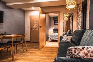 Posedenie v ubytovaní Apartamenty Jedlina