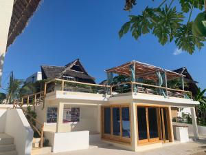 a house under construction on the beach at ZANZIBAR TROPICAL SUNSET - Adults Only Boutique Hotel by Sofia Collection in Kiwengwa