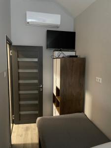 TV a/nebo společenská místnost v ubytování Sirály 2 Apartman