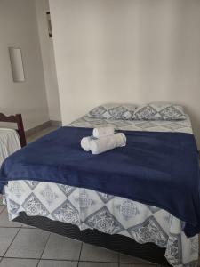 Voodi või voodid majutusasutuse Pousada Caravelas - Centro de Paraty toas