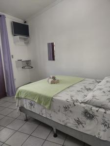 Voodi või voodid majutusasutuse Pousada Caravelas - Centro de Paraty toas