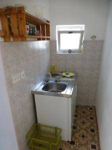Kuchyň nebo kuchyňský kout v ubytování Guesthouse Bracanović