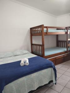 Postel nebo postele na pokoji v ubytování Pousada Caravelas - Centro de Paraty