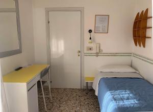 Letto o letti in una camera di Albergo Moderno