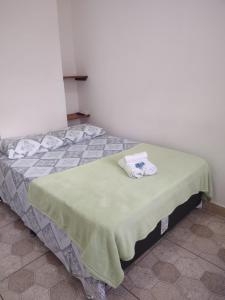 Voodi või voodid majutusasutuse Pousada Caravelas - Centro de Paraty toas