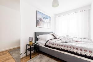 Posteľ alebo postele v izbe v ubytovaní Dom Pod Gubałówką - Zakopane Apartamenty
