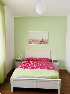 Tempat tidur dalam kamar di Via Padova 165