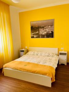 Postel nebo postele na pokoji v ubytování Via Padova 165