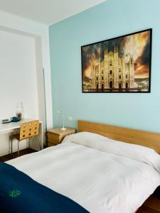 Postel nebo postele na pokoji v ubytování Via Padova 165