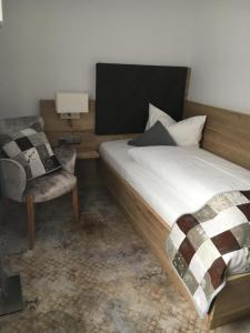 Vuode tai vuoteita majoituspaikassa Stadt-Gut-Hotels - Das Kleine Hotel