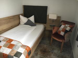 Vuode tai vuoteita majoituspaikassa Stadt-Gut-Hotels - Das Kleine Hotel