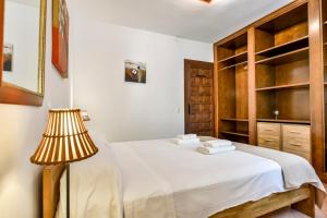 Ein Bett oder Betten in einem Zimmer der Unterkunft Villas Guzman - Flores
