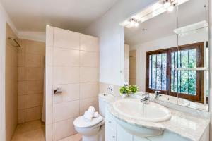 Ein Badezimmer in der Unterkunft Villas Guzman - Flores