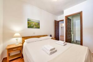 Ein Bett oder Betten in einem Zimmer der Unterkunft Villas Guzman - Flores
