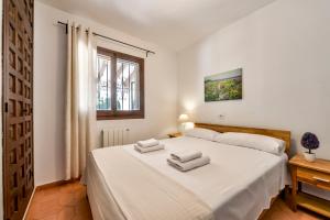 Ein Bett oder Betten in einem Zimmer der Unterkunft Villas Guzman - Flores