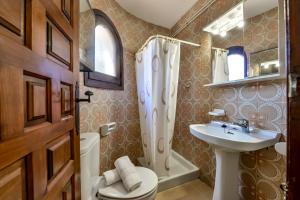 Ein Badezimmer in der Unterkunft Villas Guzman - Flores