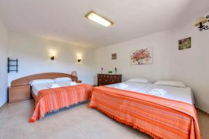Ein Bett oder Betten in einem Zimmer der Unterkunft Villas Guzman - Flores